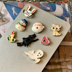 Character Earrings, 8 singles on card, Santa, witch, ghost, heart, bunny